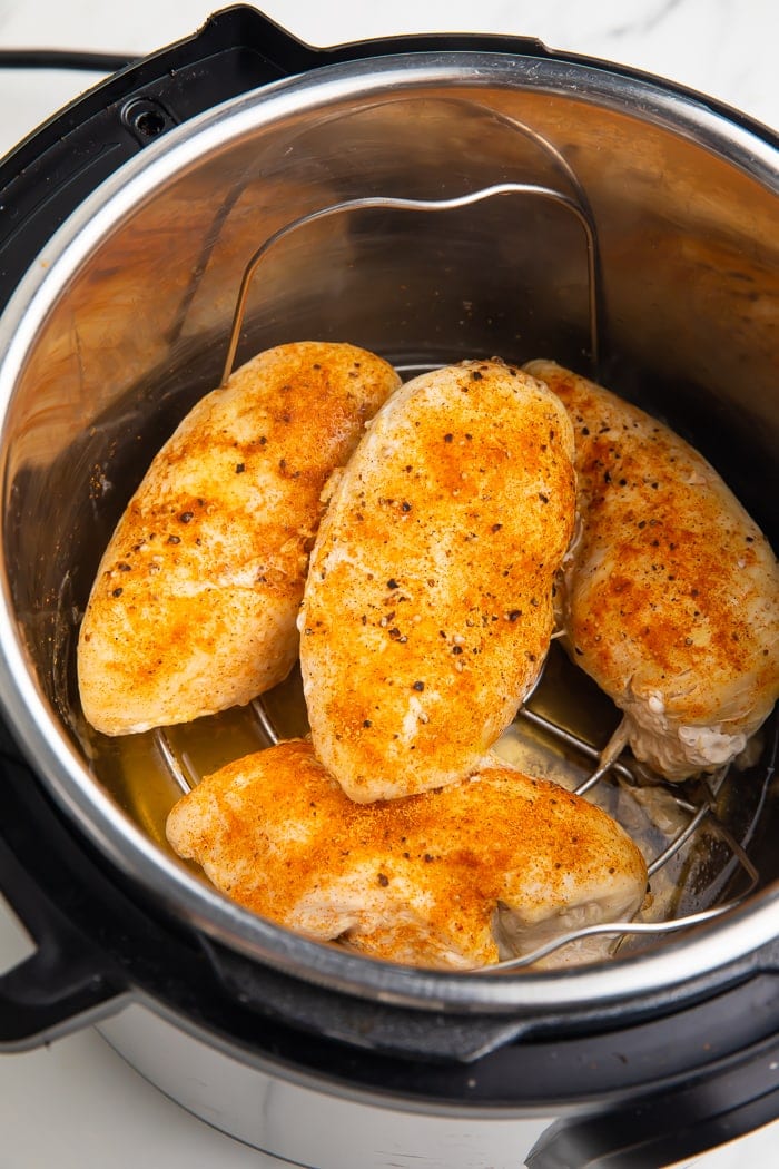 cooked, seasoned chicken breasts in an instant pot after cooking