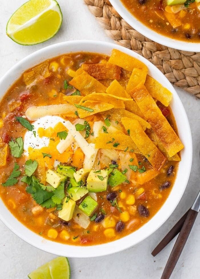 8 can taco soup in a white bowl