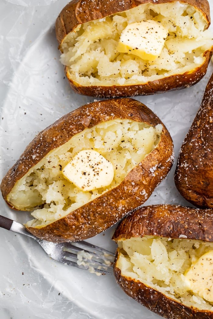 Air fryer baked potatoes on a plate
