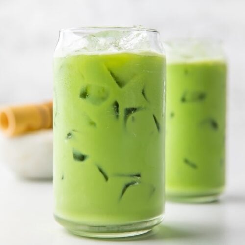 Two glasses of iced matcha latte