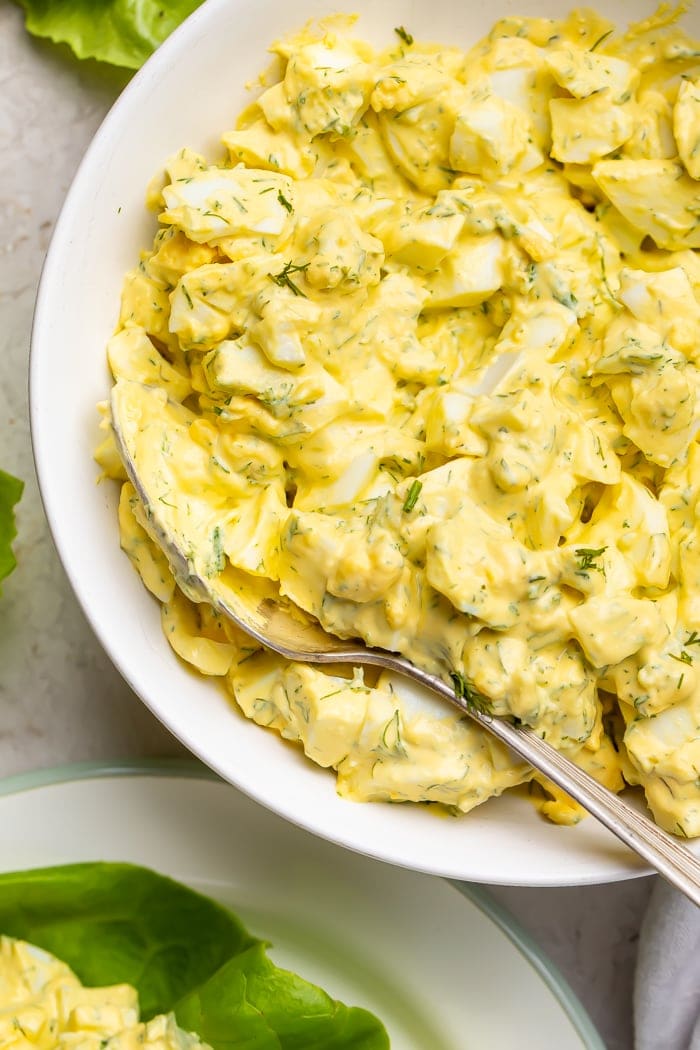 Keto egg salad in a bowl with a spoon