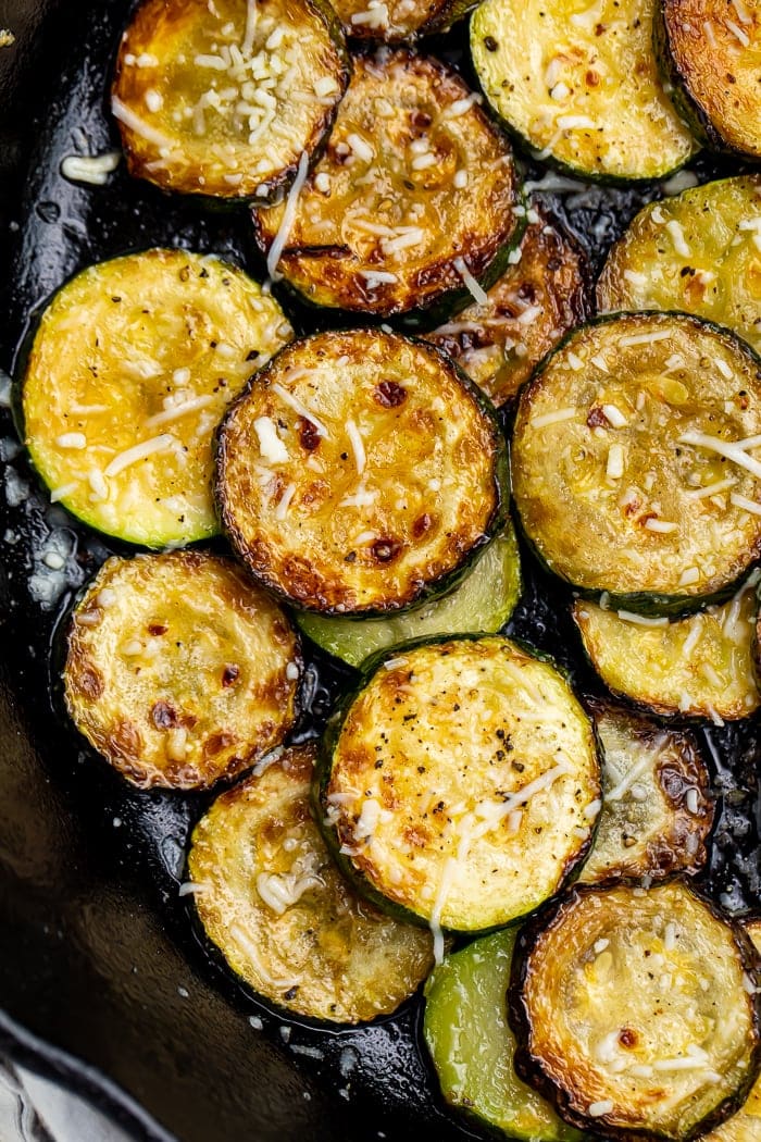 Close-up of sauteed zucchini in a skillet