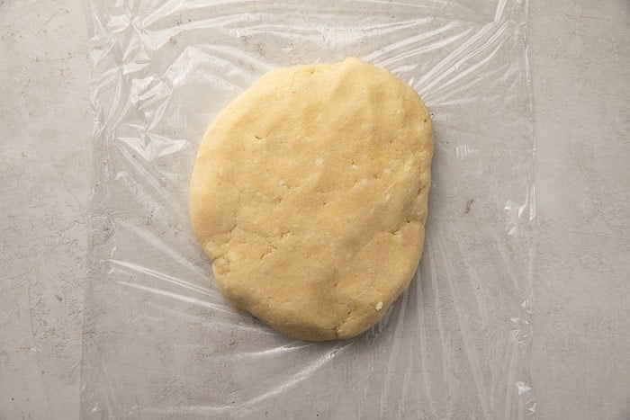 Keto pie dough on plastic wrap