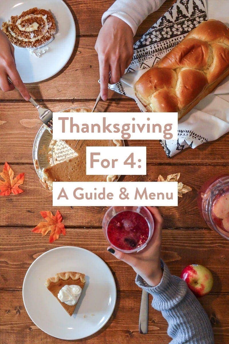 Thanksgiving for 4 on a background with a tabletop full of food