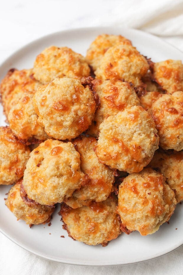 Cream cheese sausage balls on a white plate