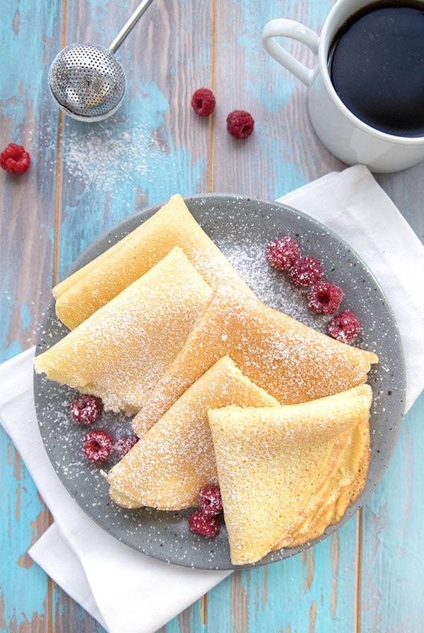 Almond flour crepes in a blue bowl