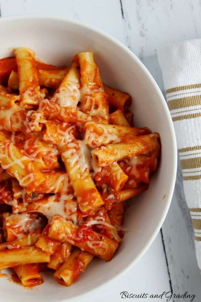 Vegetarian instant pot baked ziti in a red sauce in a white bowl
