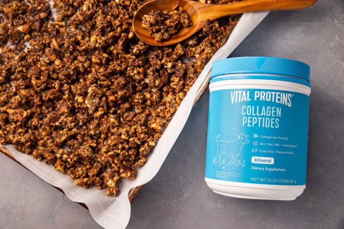 Vital Proteins collagen peptides container next to a sheet pan of keto granola