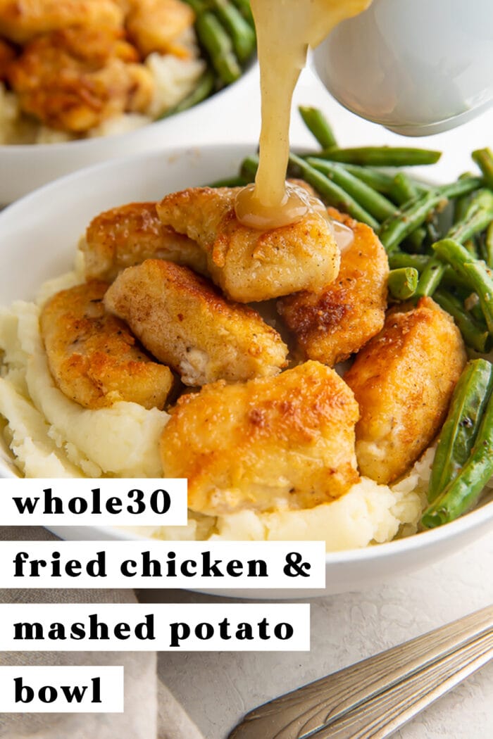 Pinterest graphic for a Whole30 fried chicken and mashed potato bowl with gravy