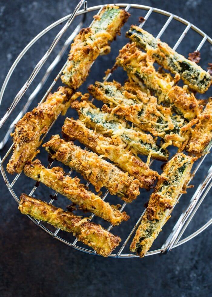 Zucchini fries on an air fryer rack