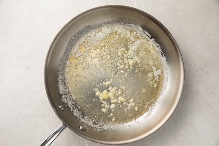 Melted butter in a stainless steel saucepan