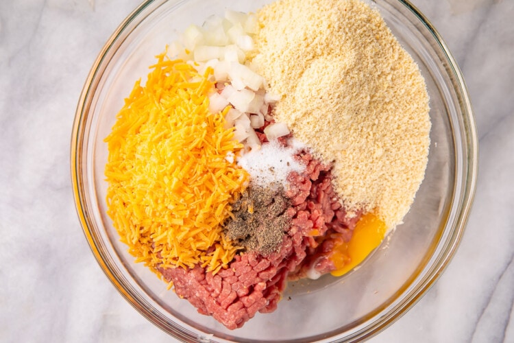 Ingredients for keto meatloaf in a large glass bowl
