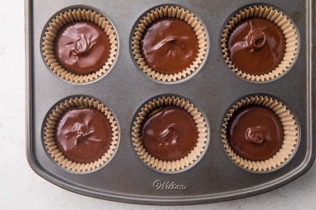 Finished keto peanut butter cups in a cupcake pan