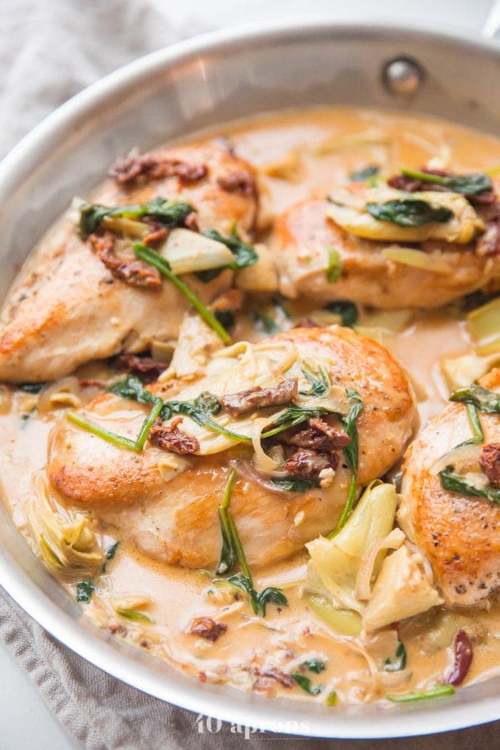 Closeup of a pan of creamy tuscan chicken