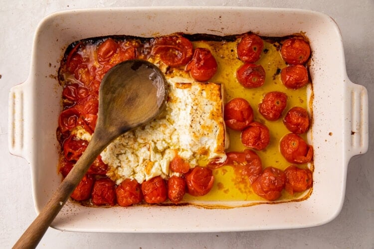 Baked feta and tomatoes in a casserole dish