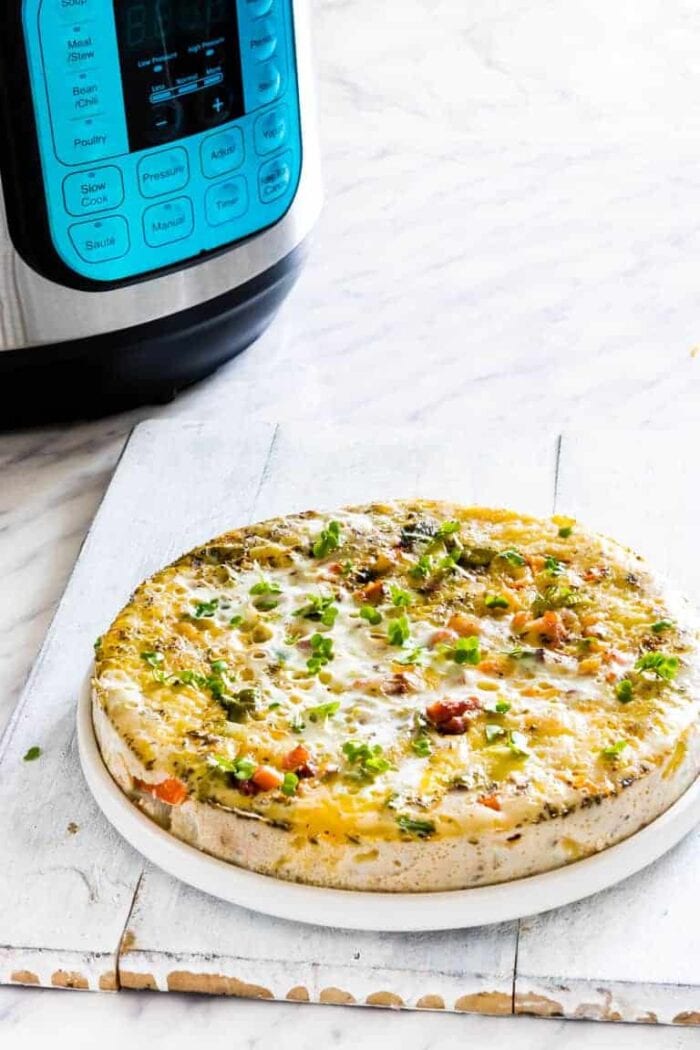 Breakfast quiche in front of an Instant Pot