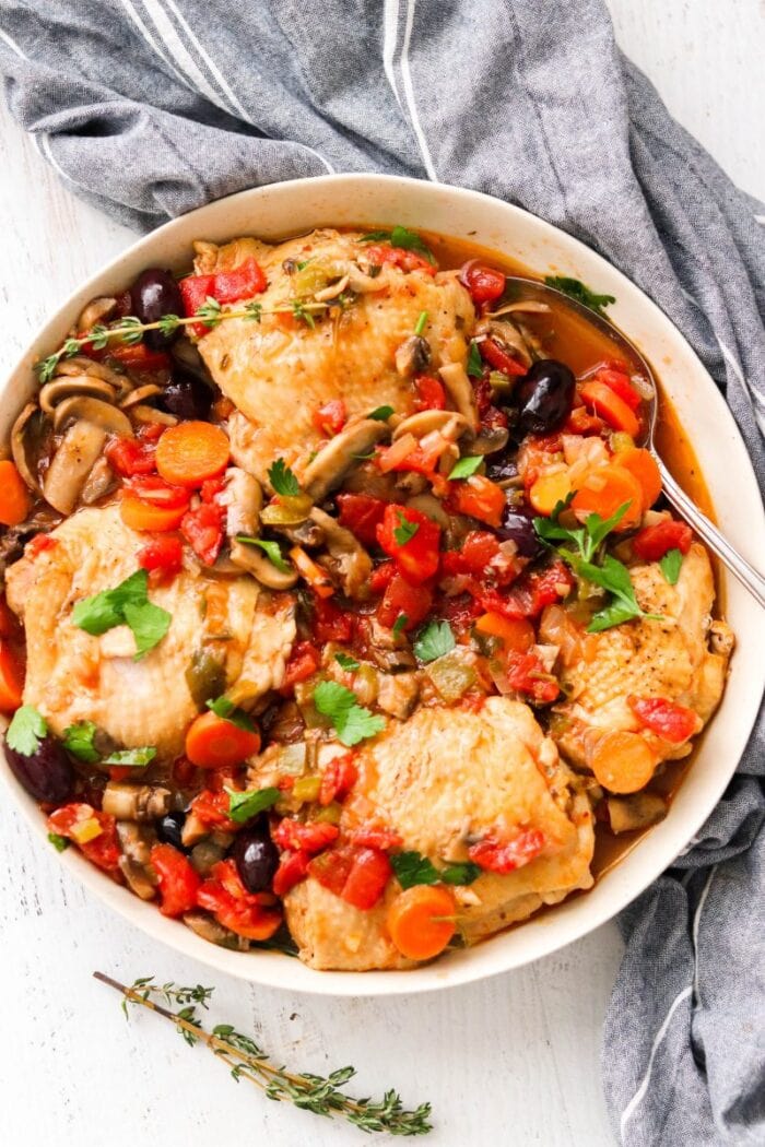 A large white bowl of chicken cacciatore from the Instant Pot