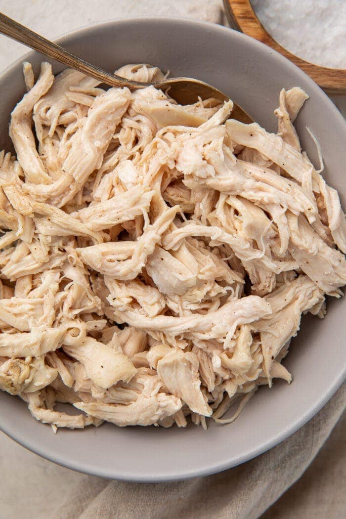 the best shredded chicken in a grey bowl