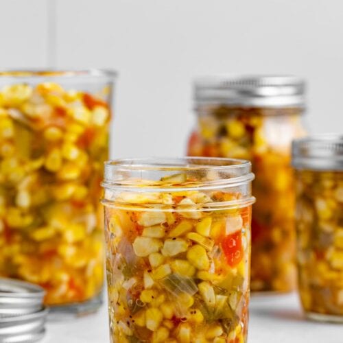 corn relish in four canning jars