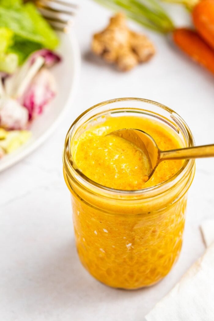 Japanese salad dressing in a jar with a spoon.