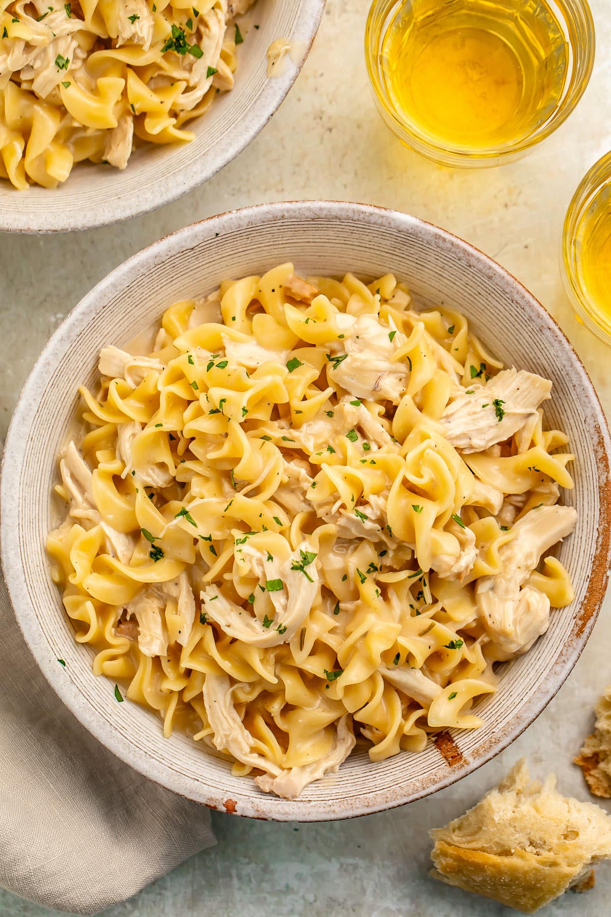 A bowl of chicken and noodles cooked in the Instant Pot.