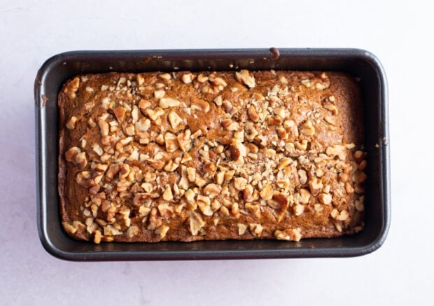 Baked vegan zucchini bread in a loaf pan