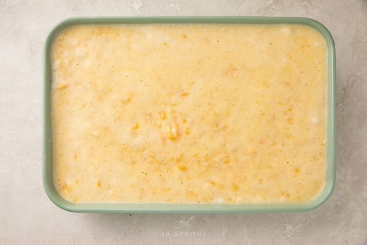 Corn souffle mixture in a souffle dish