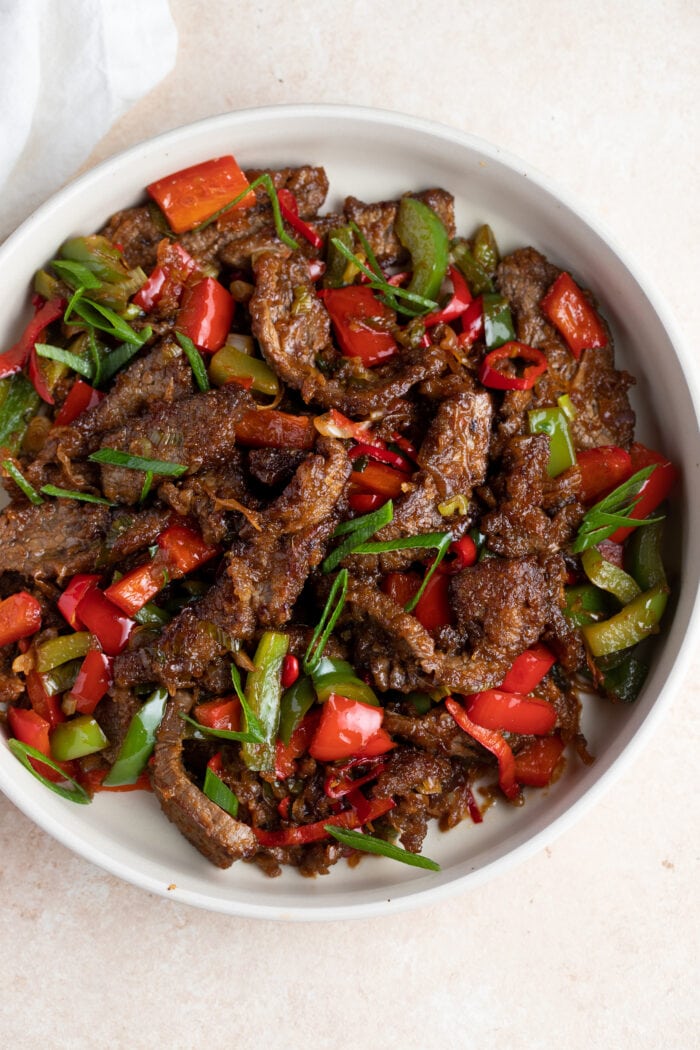 Overhead angle of Hunan beef in a white bowl