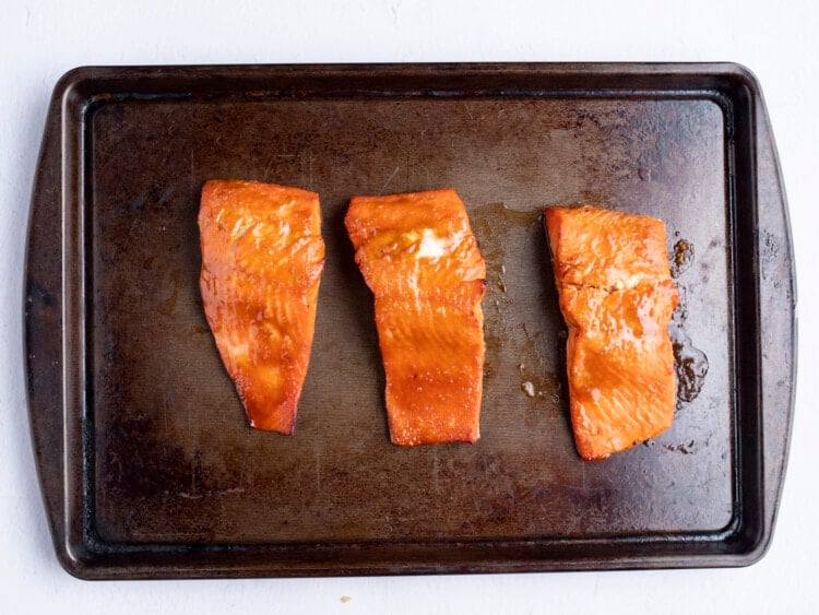Miso salmon fillets on baking sheet