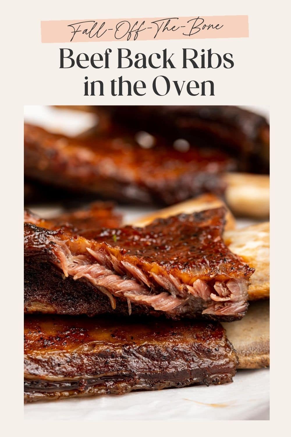 Close up of beef baby back ribs. There is a frame on the image with optimized text.