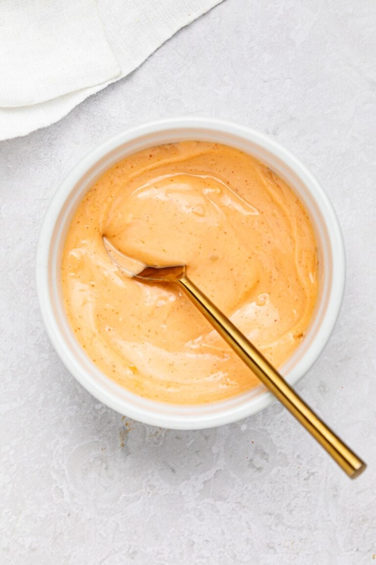 spicy mayo in a bowl with a spoon