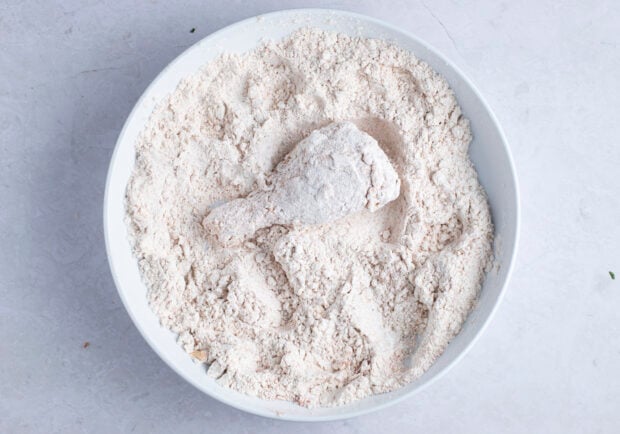 Chicken drumstick in flour mixture
