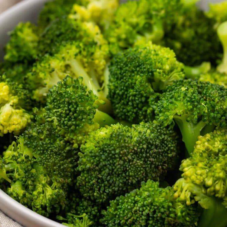 Instant Pot broccoli in a white bowl