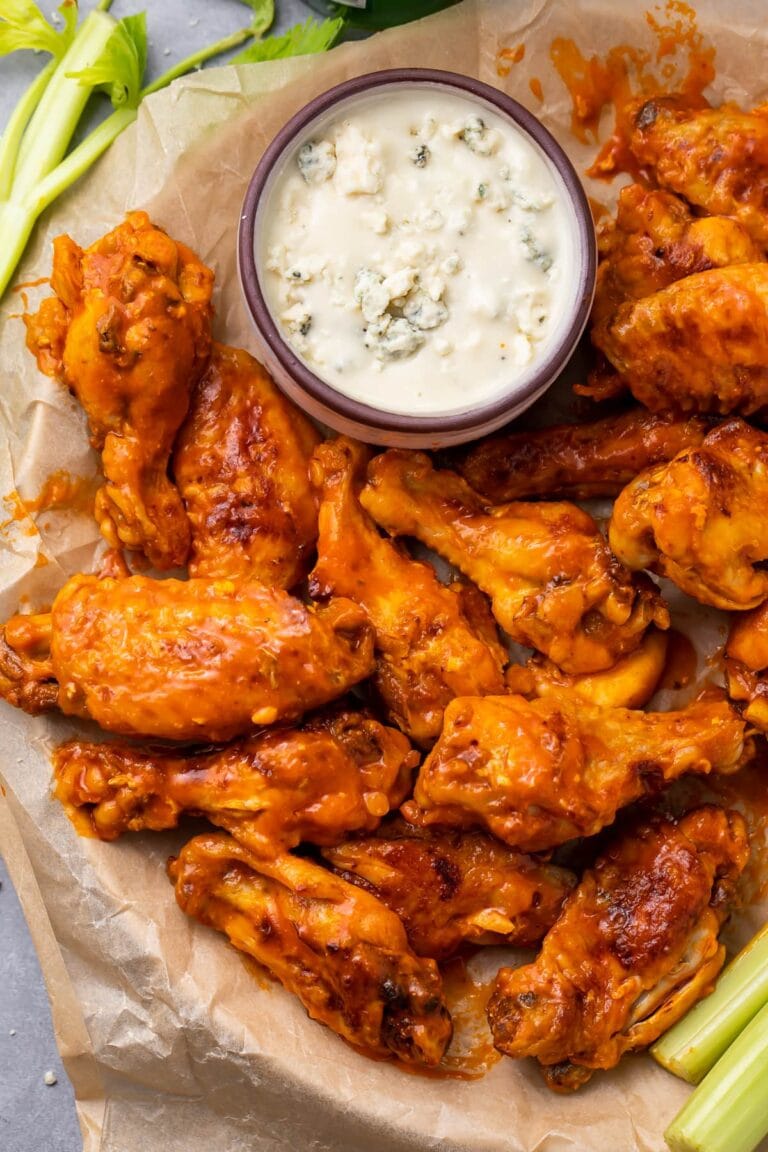 A plate of Instant Pot chicken wings with ranch dressing