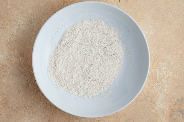 Flour mixture for salmon meuniere on a large plate