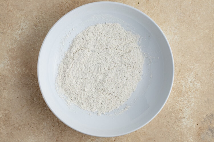 Flour mixture for salmon meuniere on a large plate