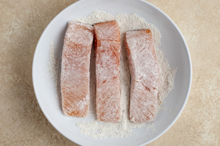 Salmon fillets in flour mixture
