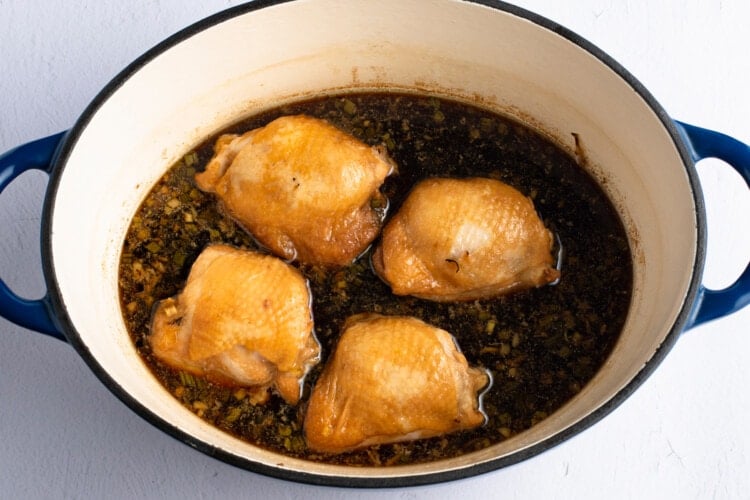 Chicken thighs in dutch oven with shoyu chicken sauce