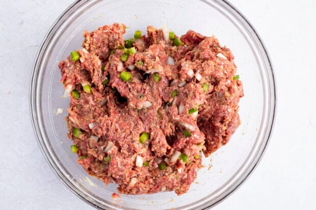 Meatloaf mixture in large glass mixing bowl