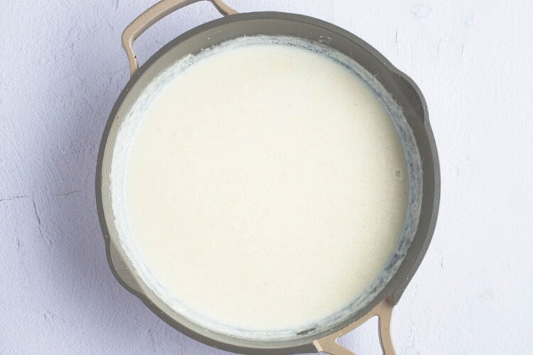 Roux and milk in large skillet
