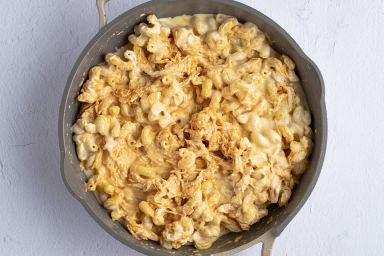 Buffalo chicken mac and cheese in large skillet
