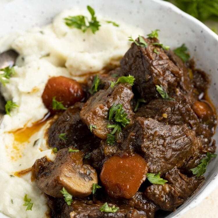 Keto beef stew with mashed cauliflower in a large bowl