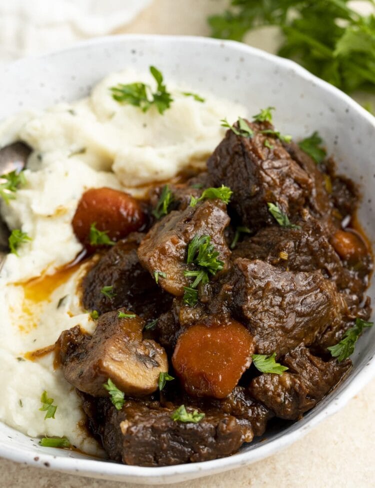 Keto beef stew with mashed cauliflower in a large bowl