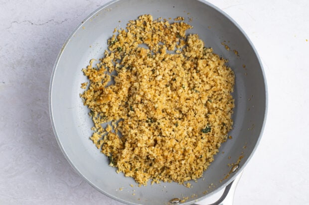 Buttered panko breadcrumbs in large skillet