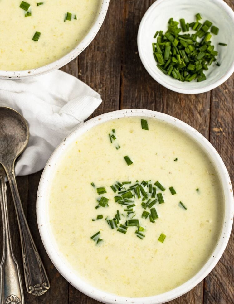 Overhead view of a bowl of cream of celery soup