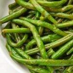 Closeup of Instant Pot green beans in a large white bowl