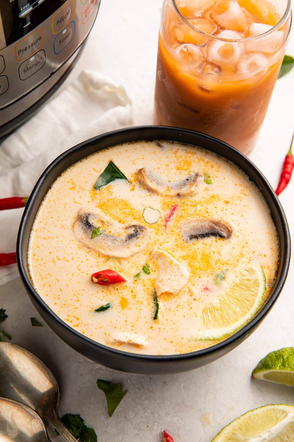 Instant Pot tom kha soup in a large black bowl