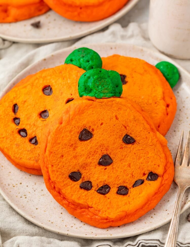 Super cute and easy jack o lantern pancakes on a plate