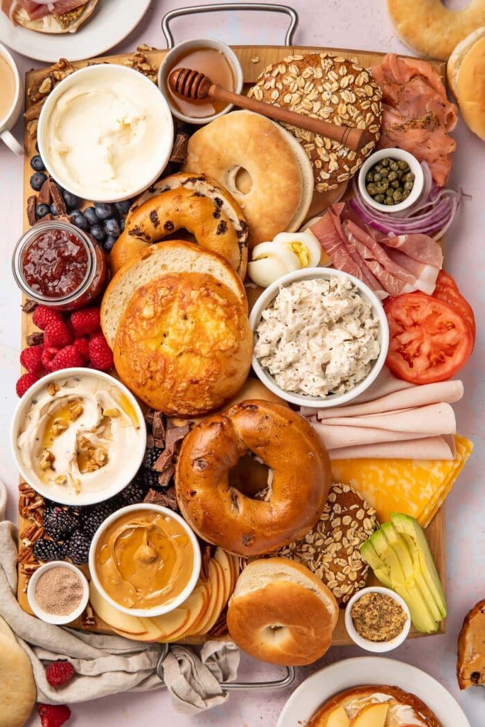 Overhead view of a bagel bar with various spreads