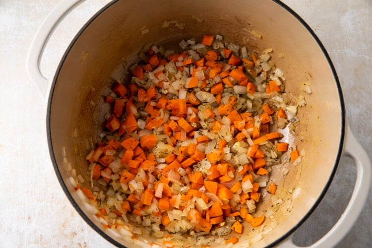 Onions, carrots and garlic in large saucepan